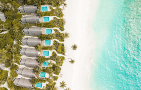 Aerial View of Fushifaru Maldives Boutique Resort with the beach