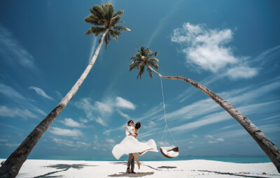 A couple dancing in the beach