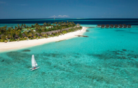 Sailing boat sailing through the ocean