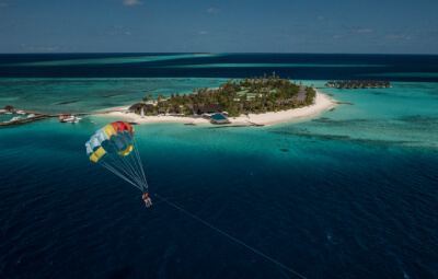 Parasailing at the Fushifaru Maldives Resort